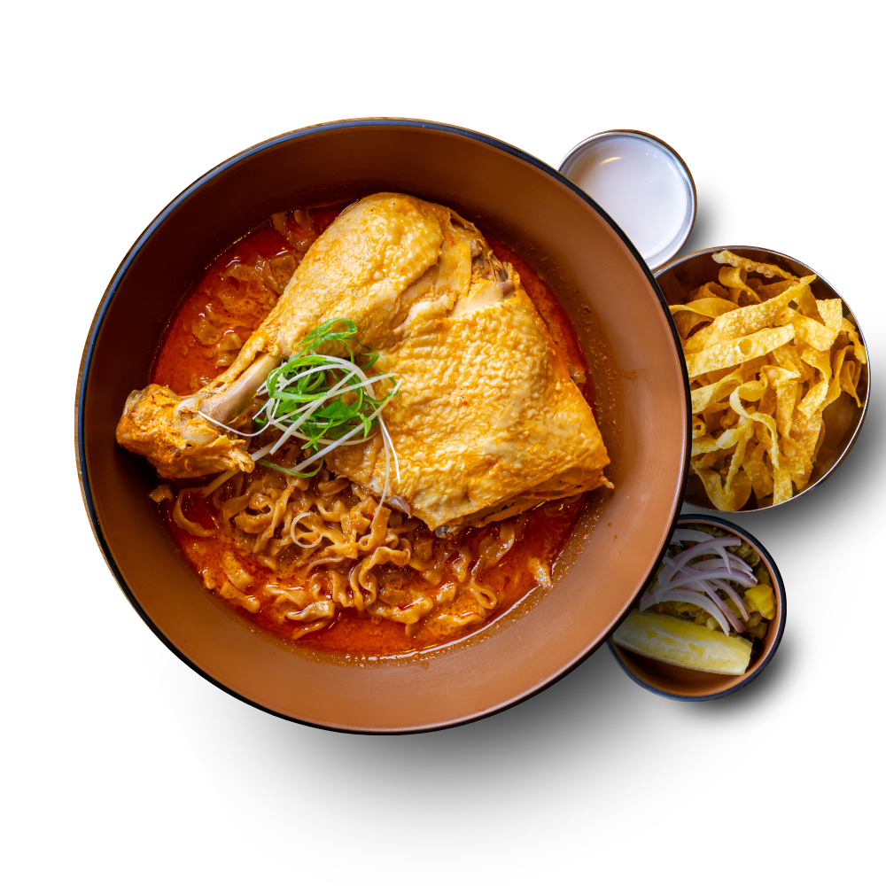 Khao Soi chicken — coconut curry noodle soup with chicken on the bone at Khaosoi