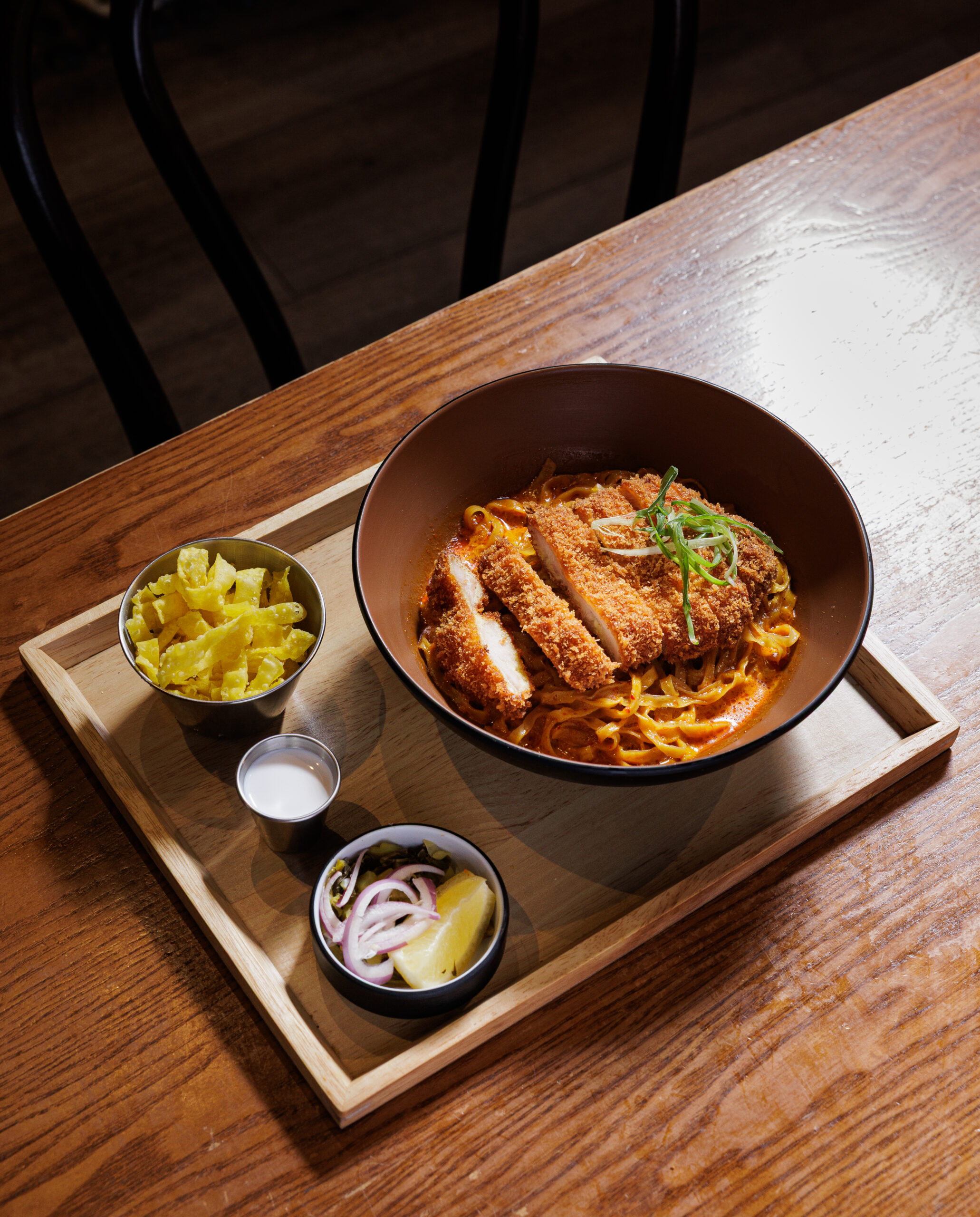 A bowl of Khao Soi — the world’s #1 coconut curry noodle soup — at Khaosoi